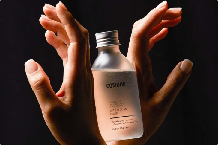 AHA Exfoliant Toner Held By Angel Hand