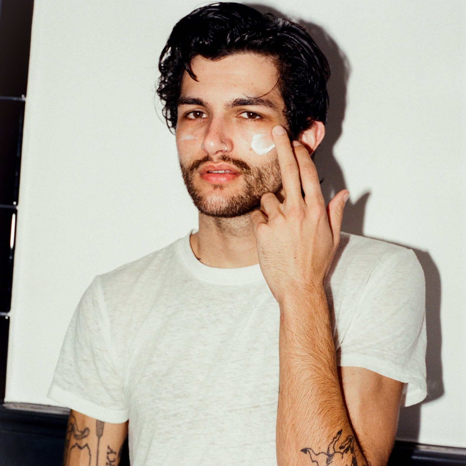 Male applying Comune's Hydra Shroom Cream