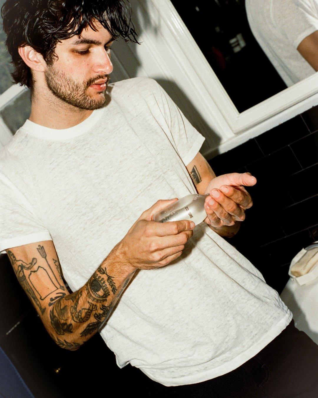 Male applying Comune's toner