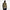 A man wearing an olive green COMUNE Luka pullover hoodie with a small black embroidered logo on the left chest, paired with a black baseball cap and dark blue jeans, standing against a white wall.