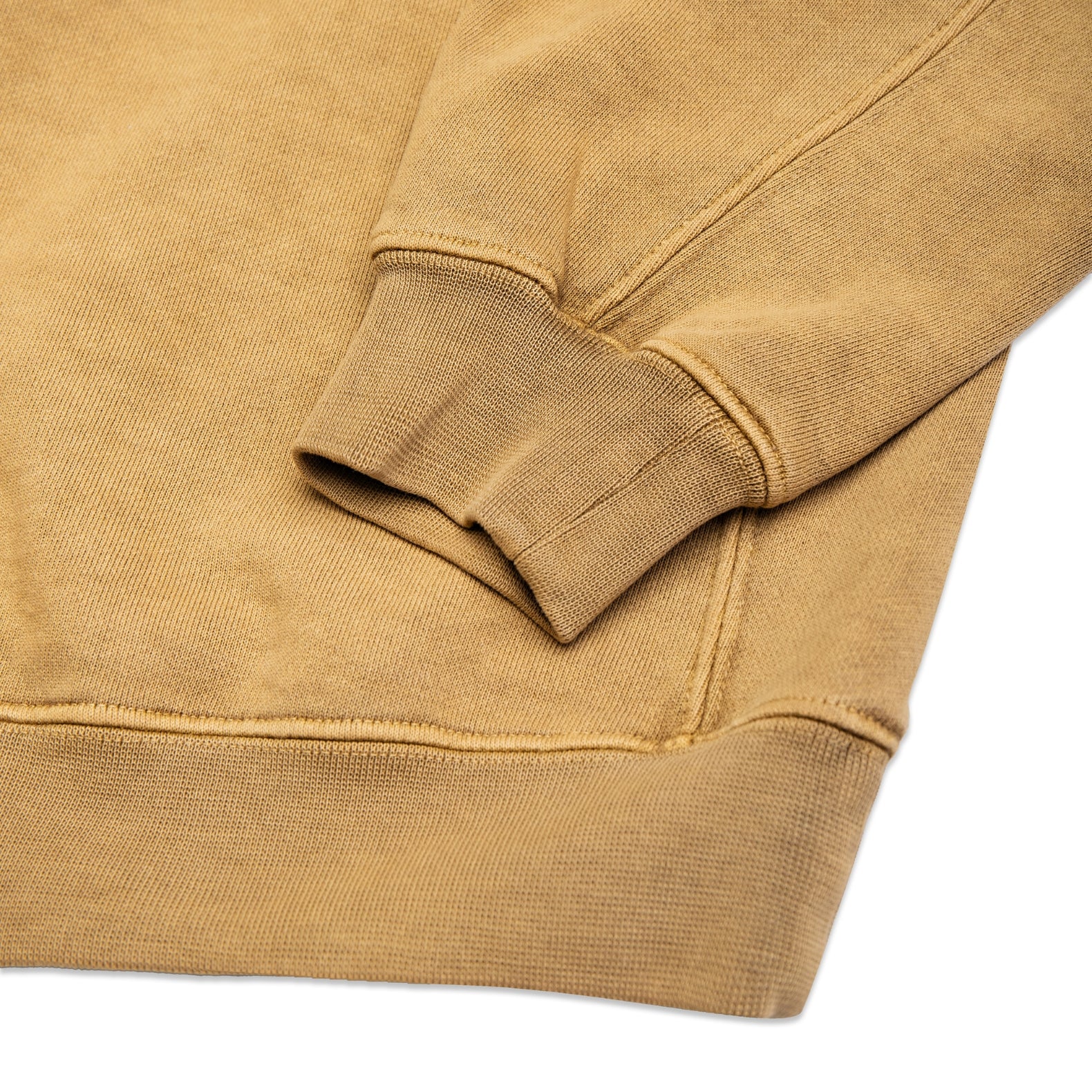 Comune Duke Crew heavyweight cotton in acorn color on white background, hem close up. COMUNE DUKE CREW | Acorn