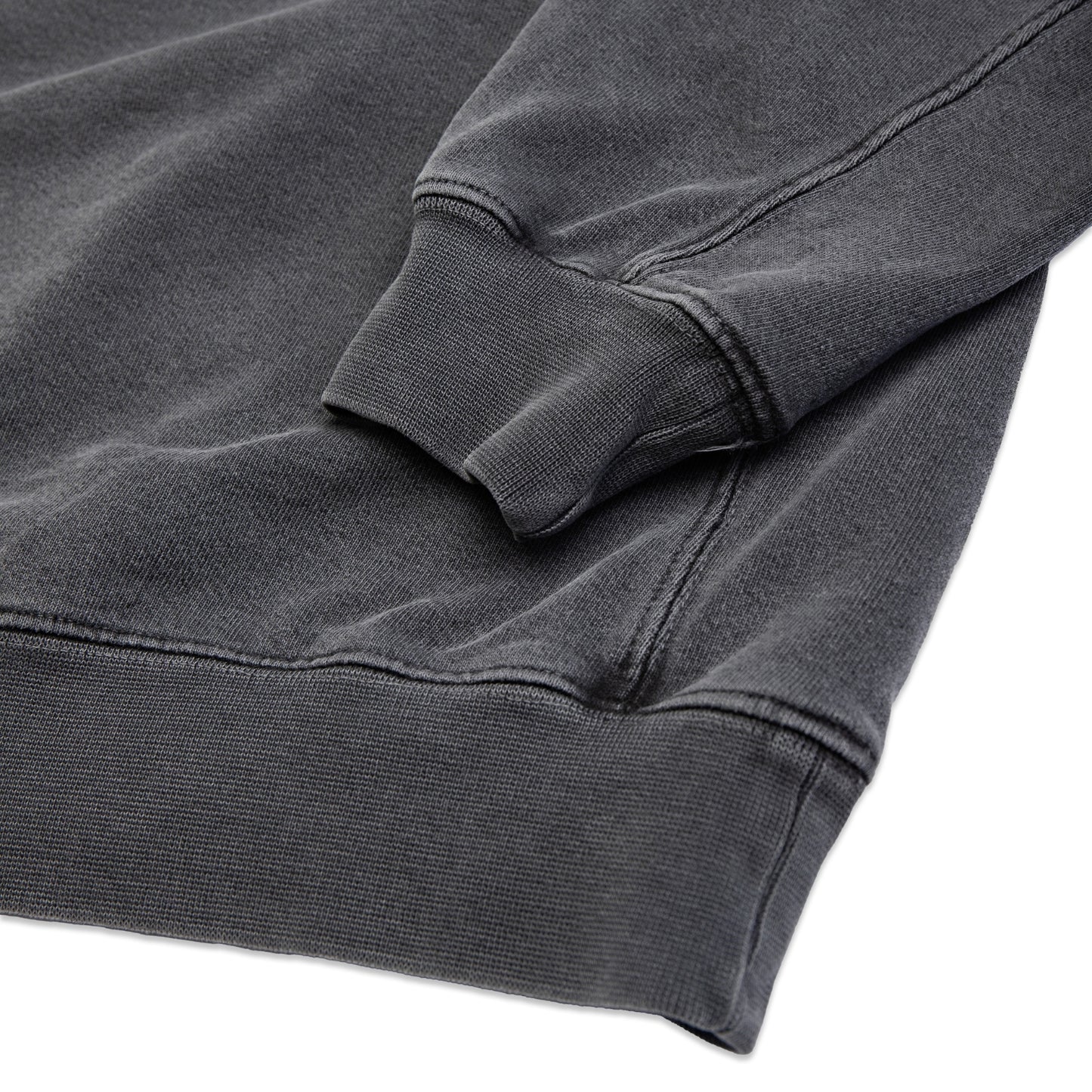 Comune Duke Crew heavyweight cotton in faded black color on white background, hem close up. COMUNE DUKE CREW | Faded Black