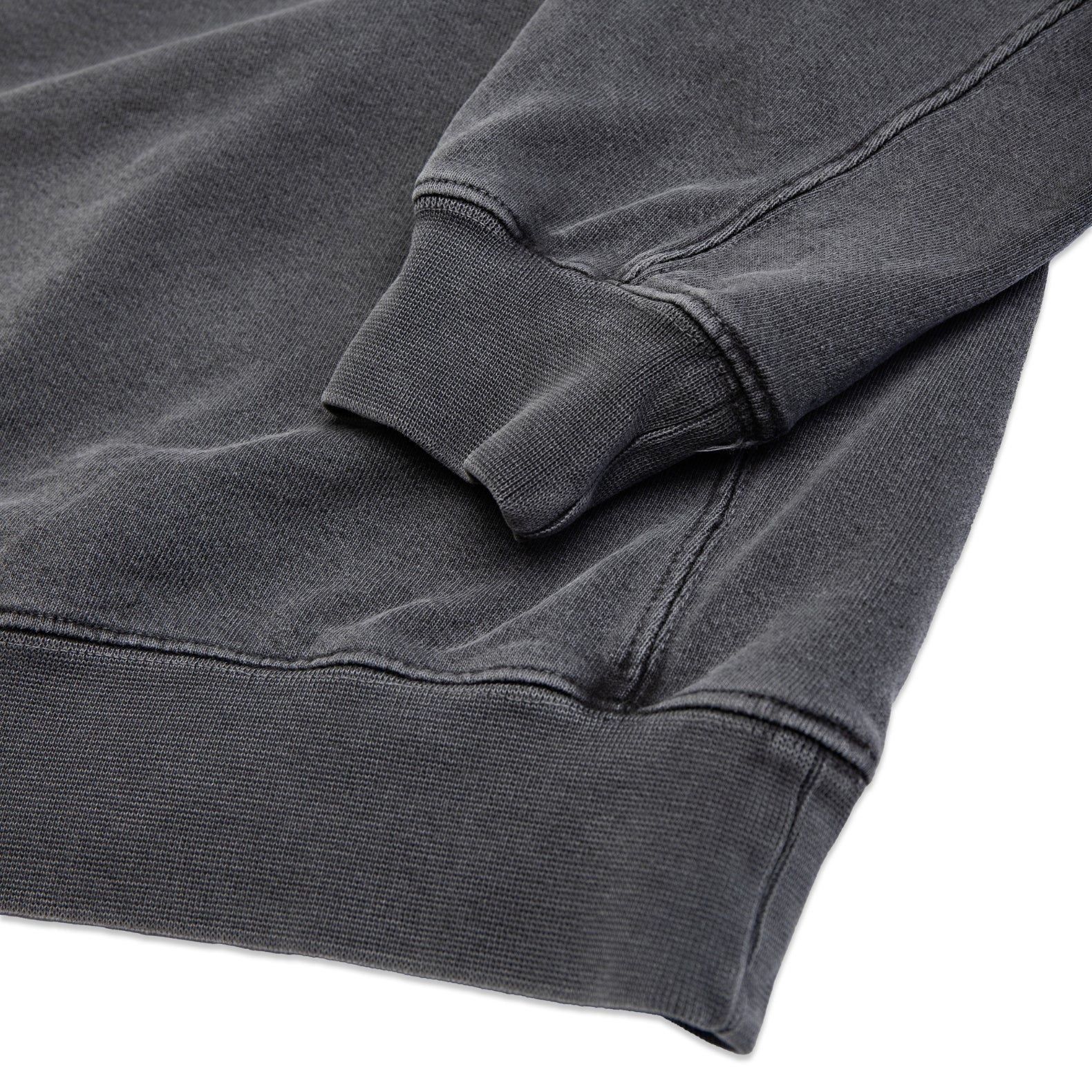 Comune Duke Crew heavyweight cotton in faded black color on white background, hem close up. COMUNE DUKE CREW | Faded Black