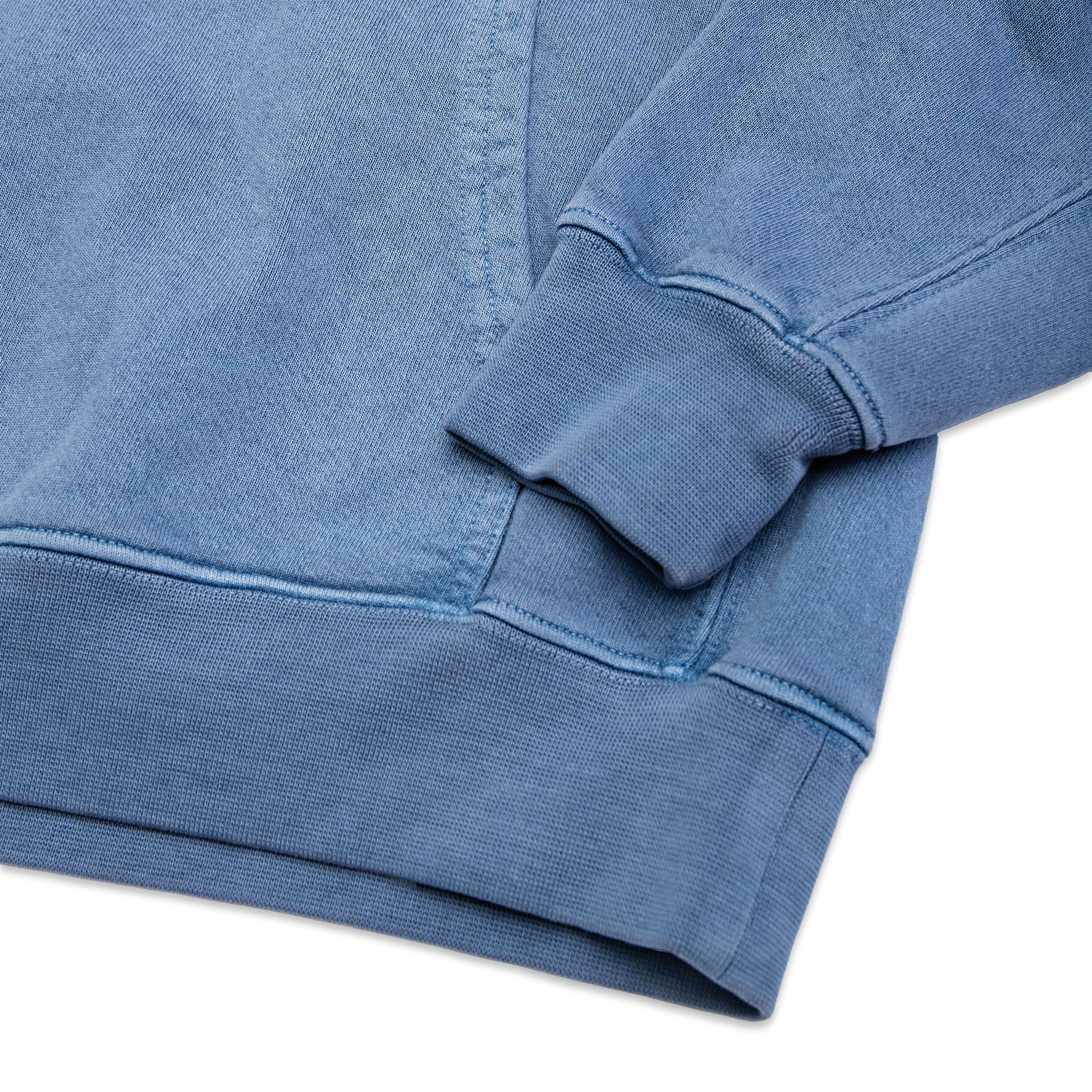 Comune Duke Hoodie heavyweight cotton in marine color on white background, hem close up. COMUNE DUKE HOODIE | Marine