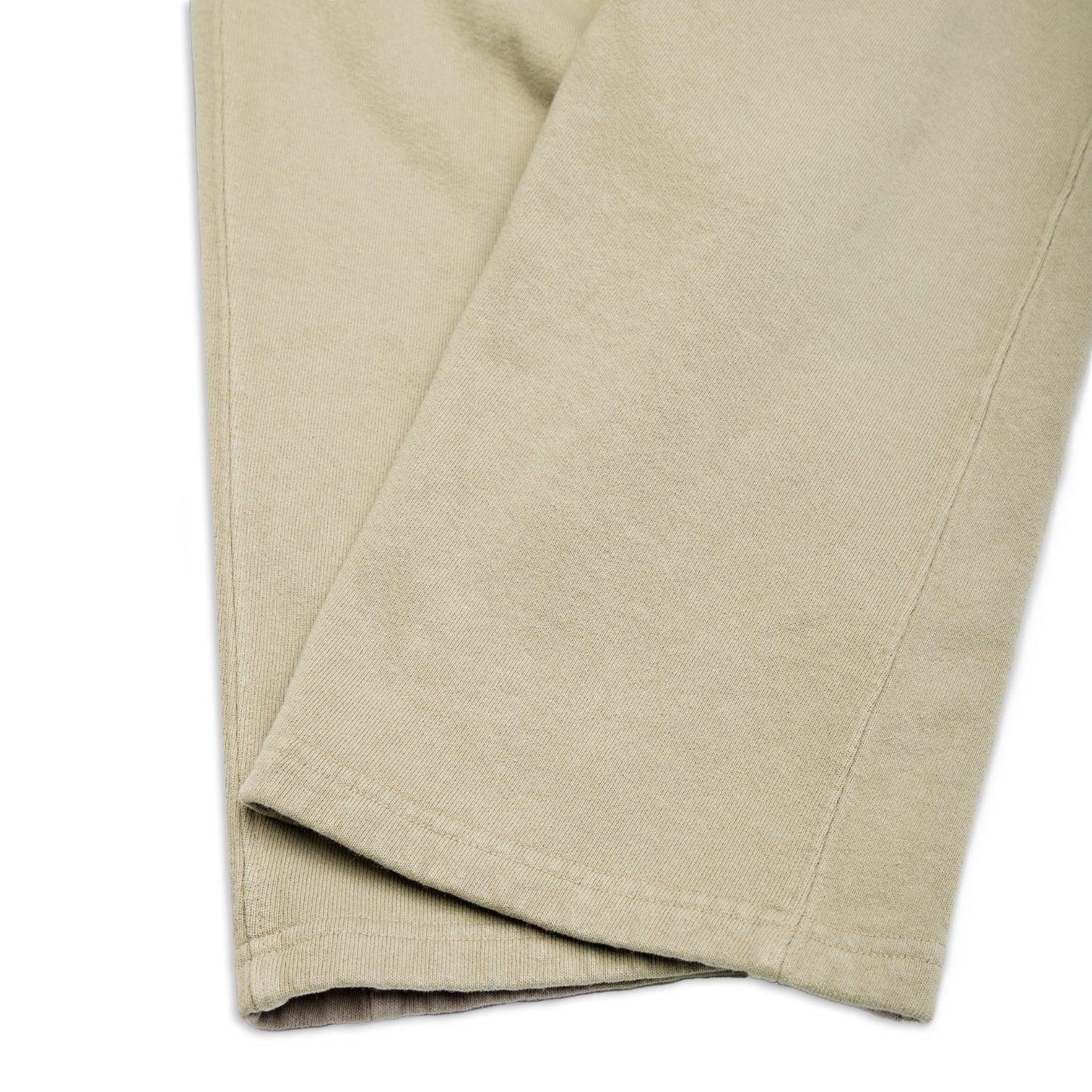 Comune Duke Sweatpants in heavyweight cotton with side gusset in sage color on white background, hem close up. COMUNE DUKE SWEATPANTS | Sage