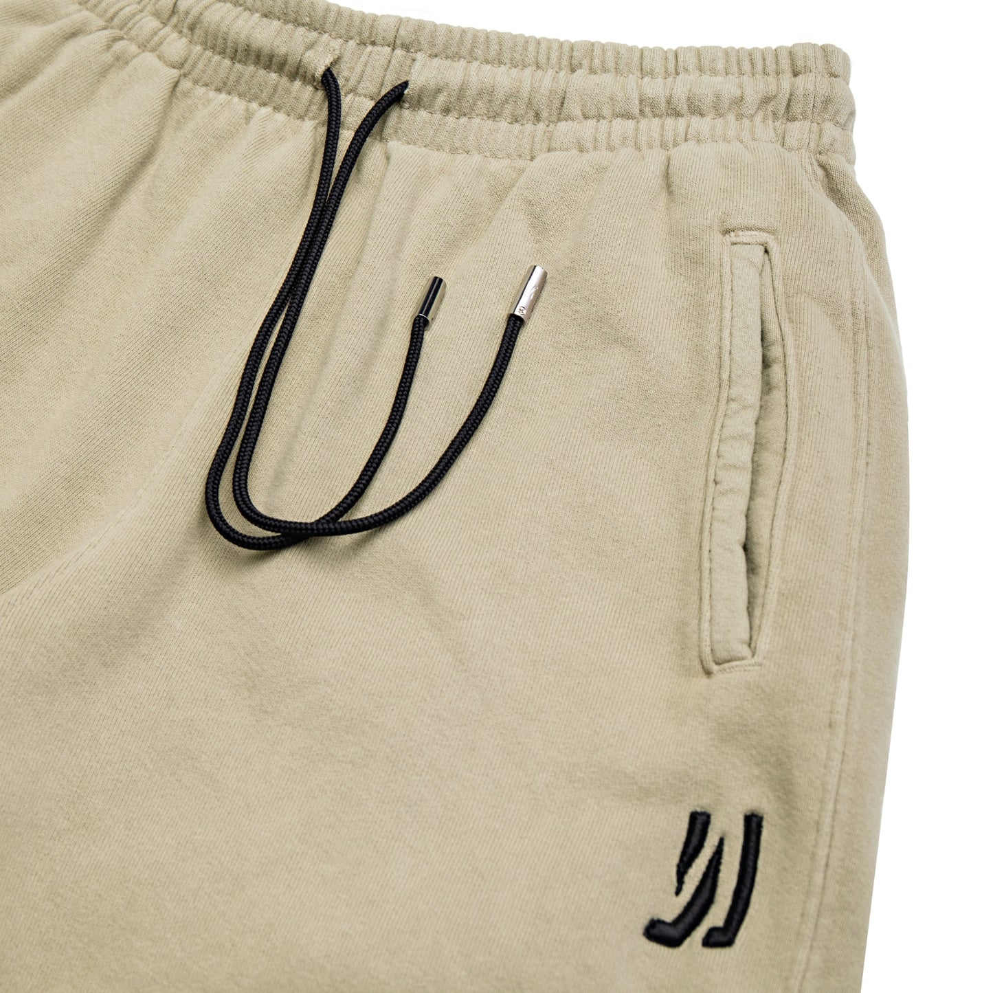 Comune Duke Sweatpants in heavyweight cotton with side gusset in sage color on white background, drawcord close up. COMUNE DUKE SWEATPANTS | Sage