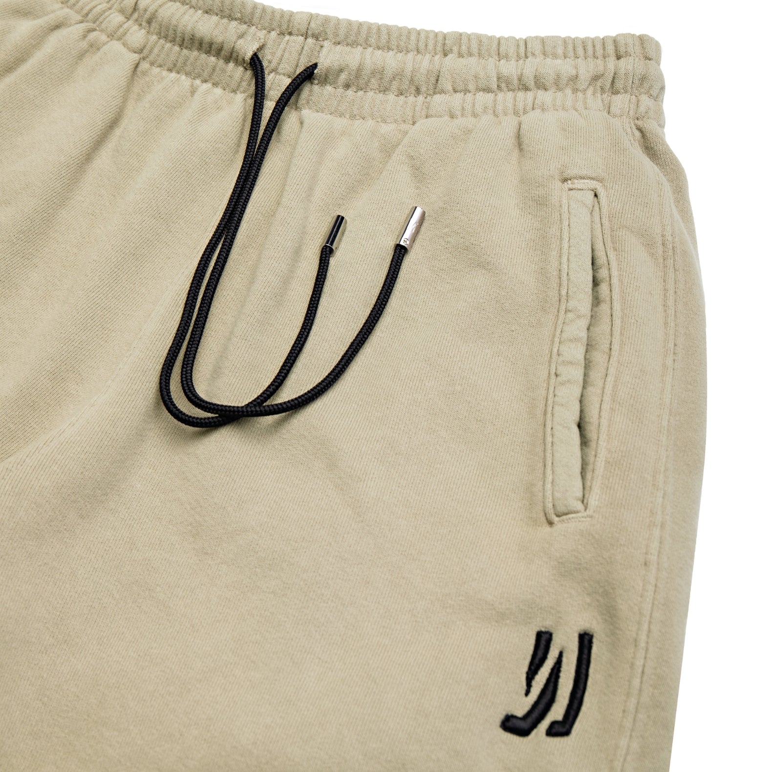 Comune Duke Sweatpants in heavyweight cotton with side gusset in sage color on white background, drawcord close up. COMUNE DUKE SWEATPANTS | Sage