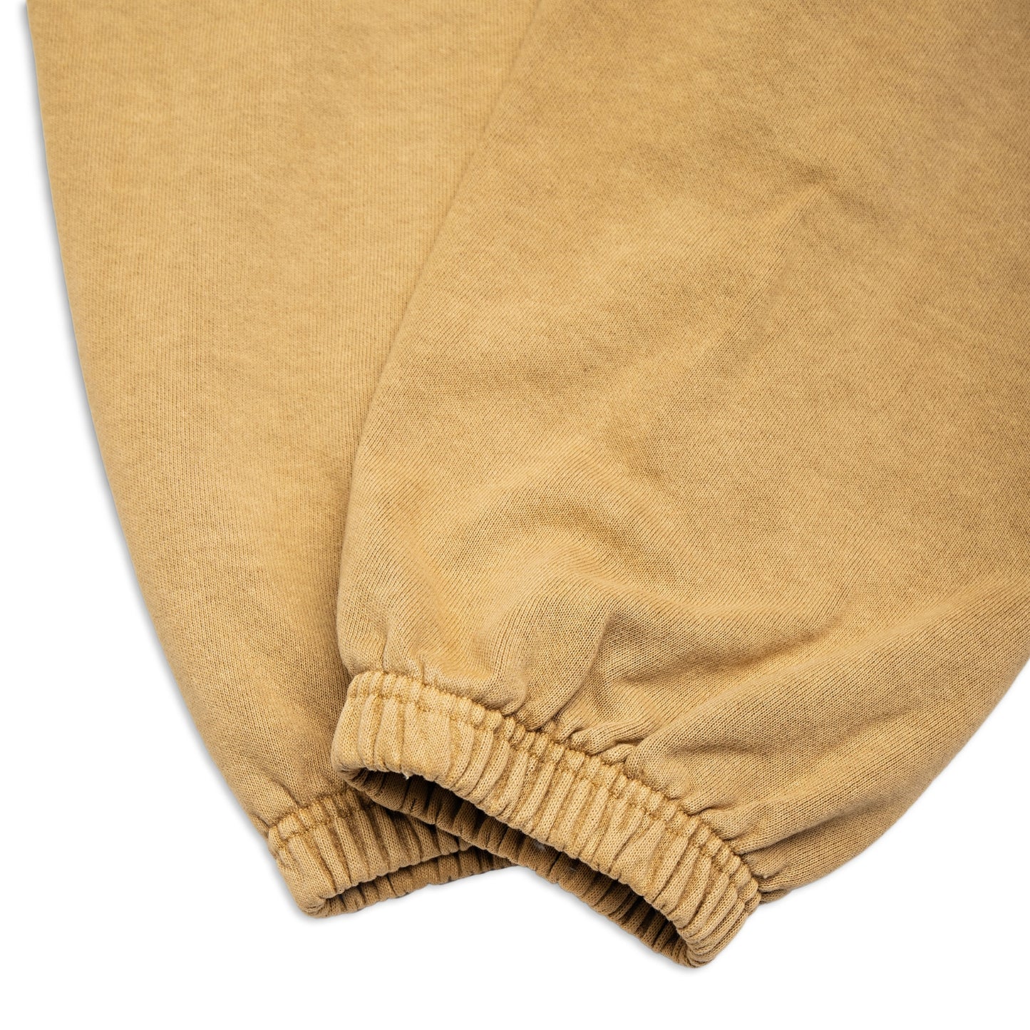 Comune Enzo Joggers heavyweight cotton in acorn color on white background, hem close up. COMUNE ENZO JOGGER | Acorn