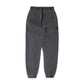 Comune Enzo Joggers heavyweight cotton in faded black color on white background, front view. COMUNE ENZO JOGGER | Faded Black