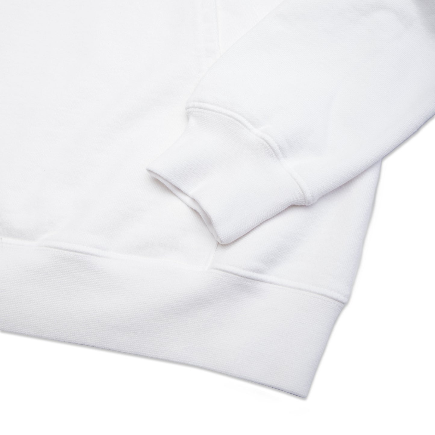 Comune Luka Hoodie heavyweight cotton sweatshirt in white color on white background, hem close up. COMUNE LUKA HOODIE | White