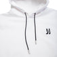 Comune Luka Hoodie heavyweight cotton sweatshirt in white color on white background, logo close up. COMUNE LUKA HOODIE | White