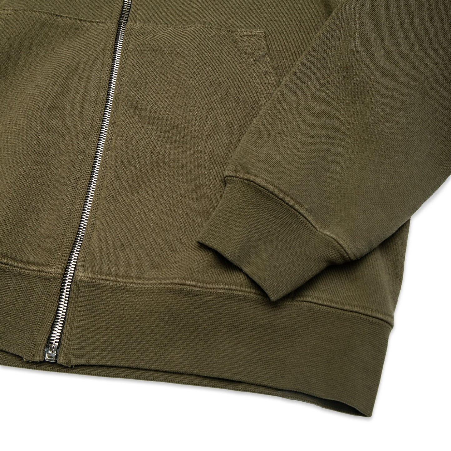 Comune Luka Zip-up heavyweight cotton hoodie in army green color on a white background, hem close up. COMUNE LUKA ZIP-UP | Army Green