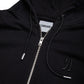 Comune Luka Zip-up heavyweight cotton hoodie in black color on a white background, logo close up. COMUNE LUKA ZIP-UP | Black