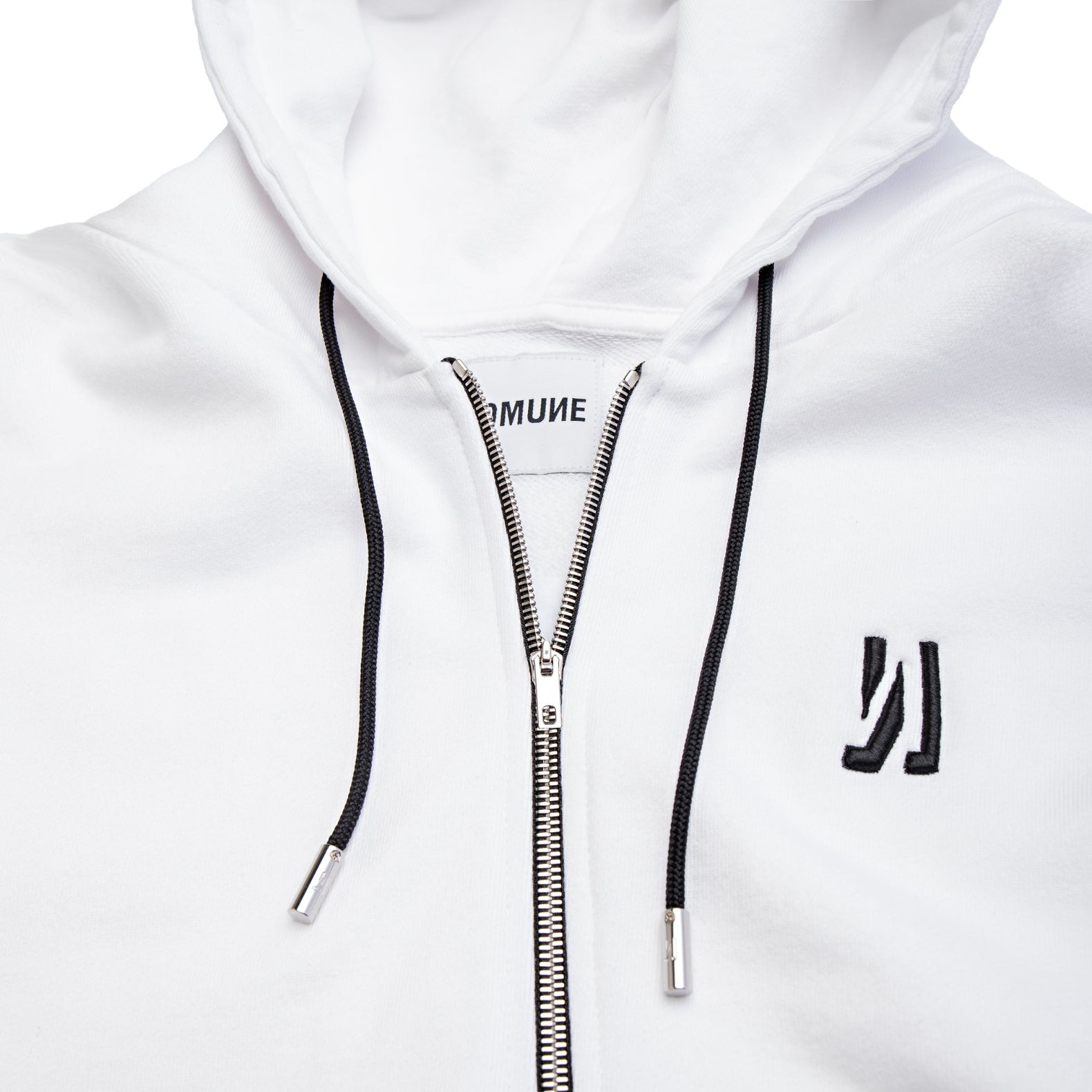 Comune Luka Zip-up in heavyweight cotton hoodie in white color on white background, logo close up. COMUNE LUKA ZIP-UP | White
