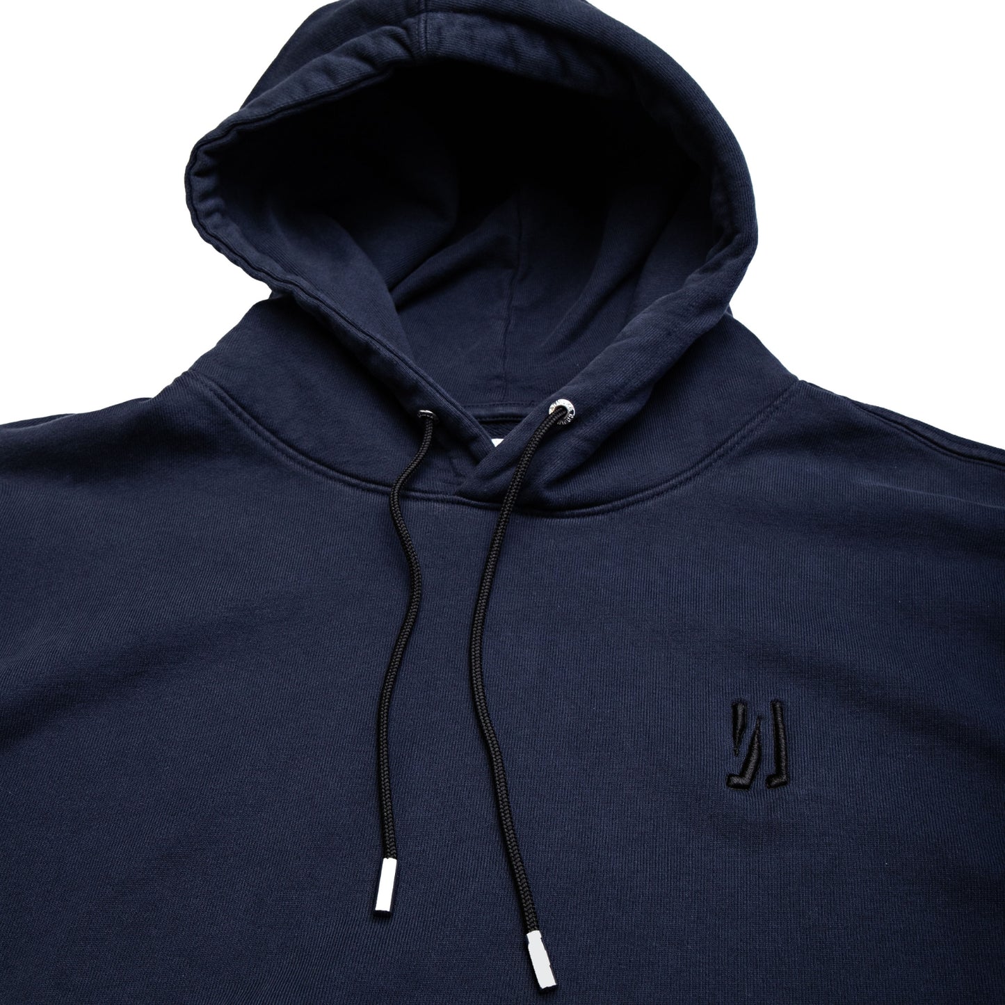 Comune Luka Hoodie heavyweight cotton sweatshirt in navy color on white background, logo close up. COMUNE LUKA HOODIE | Navy
