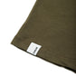 Comune Nori tee in soft 100% supima cotton in army green color on white background, label and hem close up. COMUNE NORI TEE | Army Green