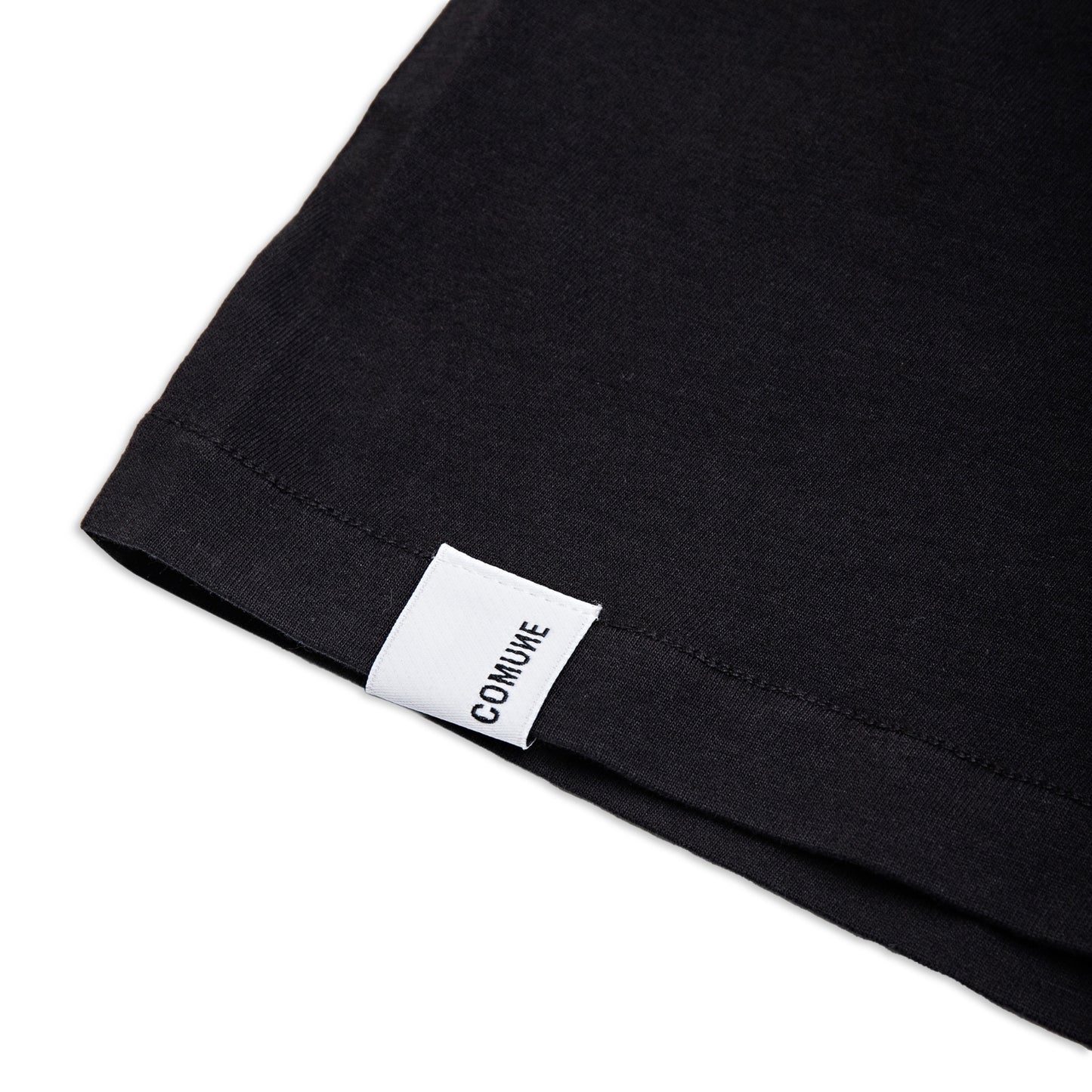 Comune Nori tee in soft 100% supima cotton in black color on white background, label and hem close up, COMUNE NORI TEE | Black