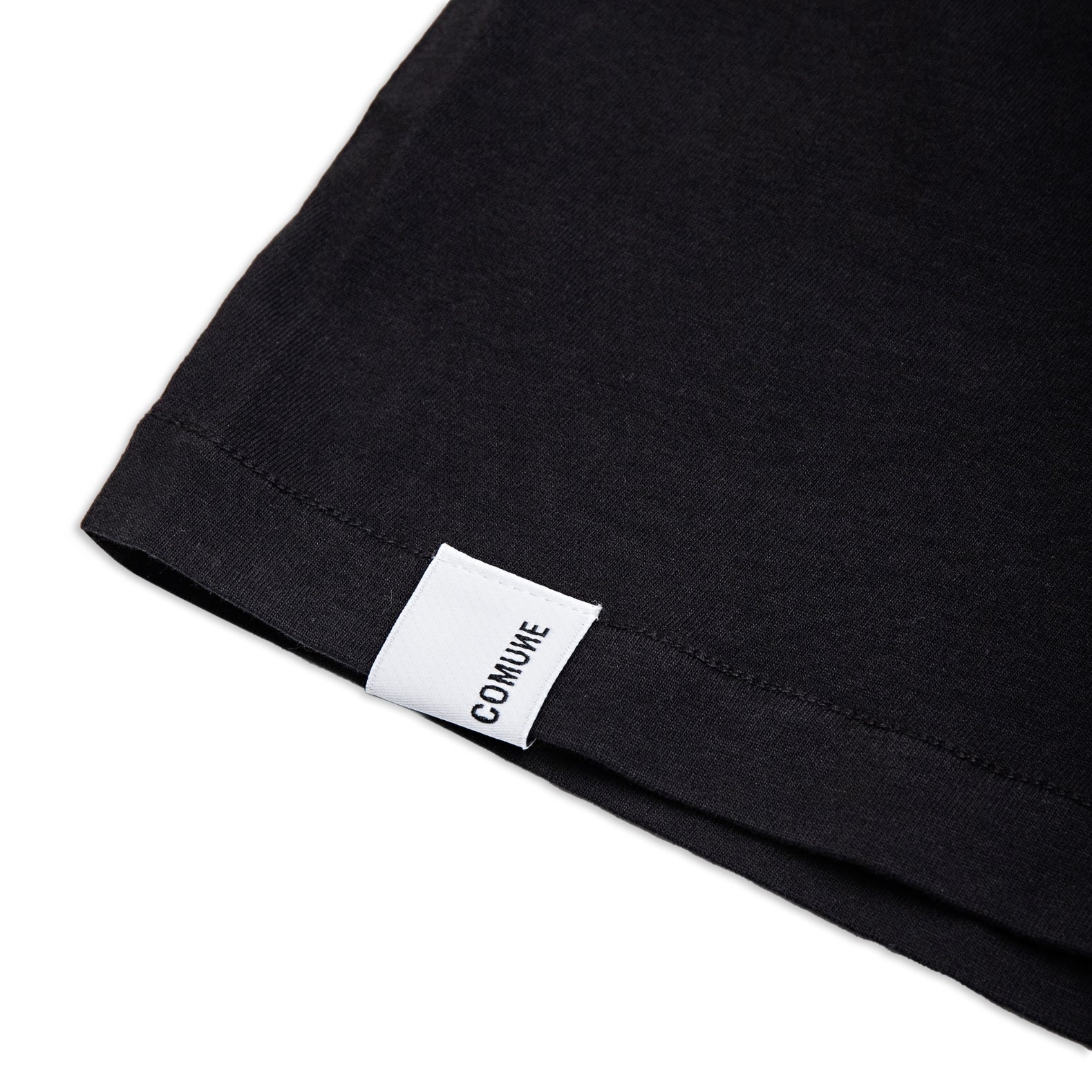 Comune Nori tee in soft 100% supima cotton in black color on white background, label and hem close up, COMUNE NORI TEE | Black