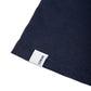 Comune Nori tee in soft 100% supima cotton in black color on white background, label and hem close up. COMUNE NORI TEE | Navy