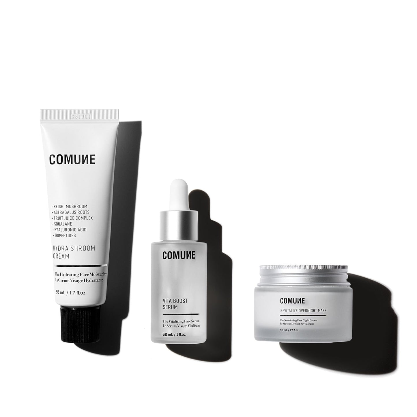 COMUNE Hydra Shroom Cream + Vita Boost Serum + Revitalize Overnight Mask on a white background.